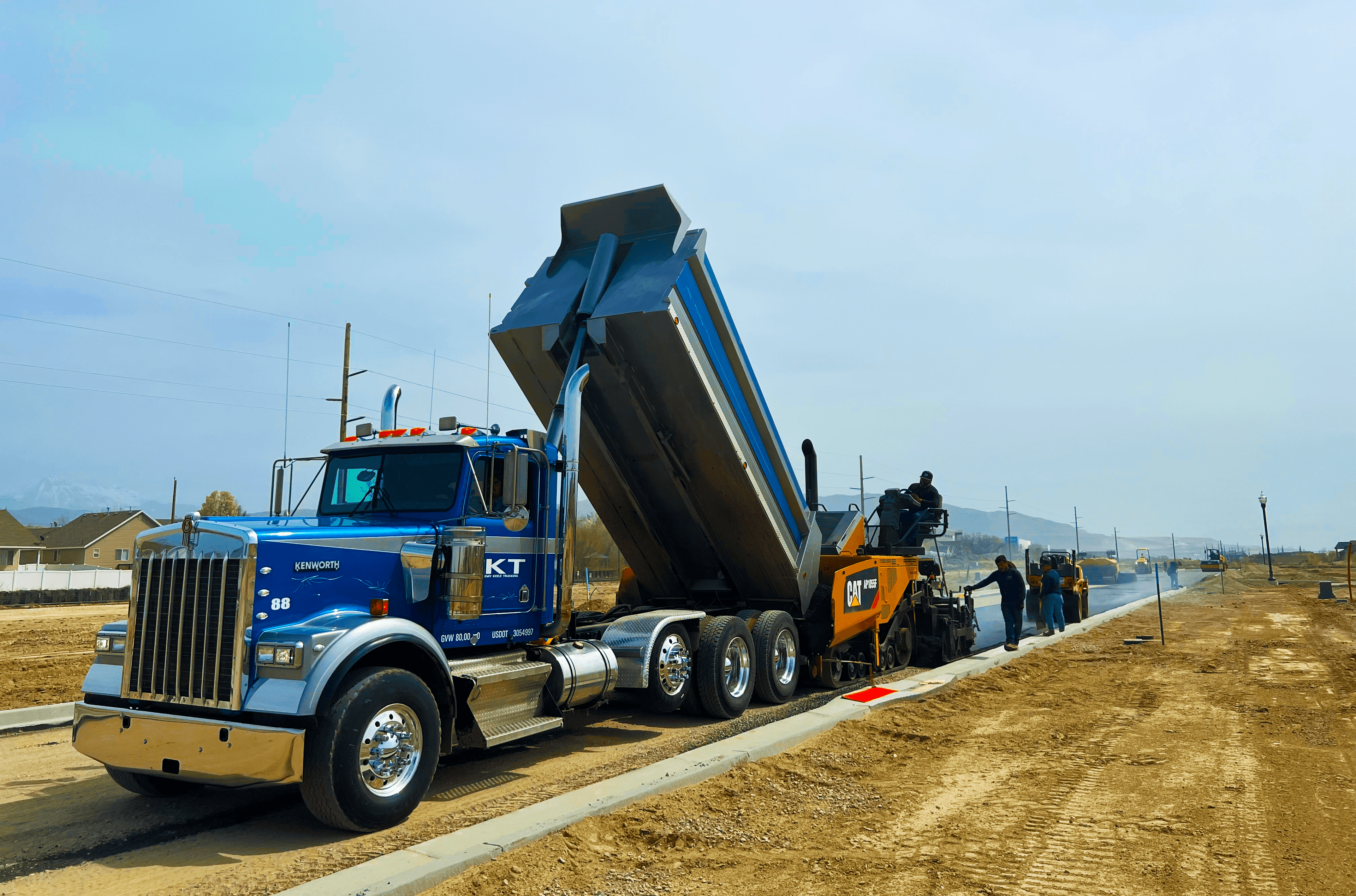 Blue paving truck